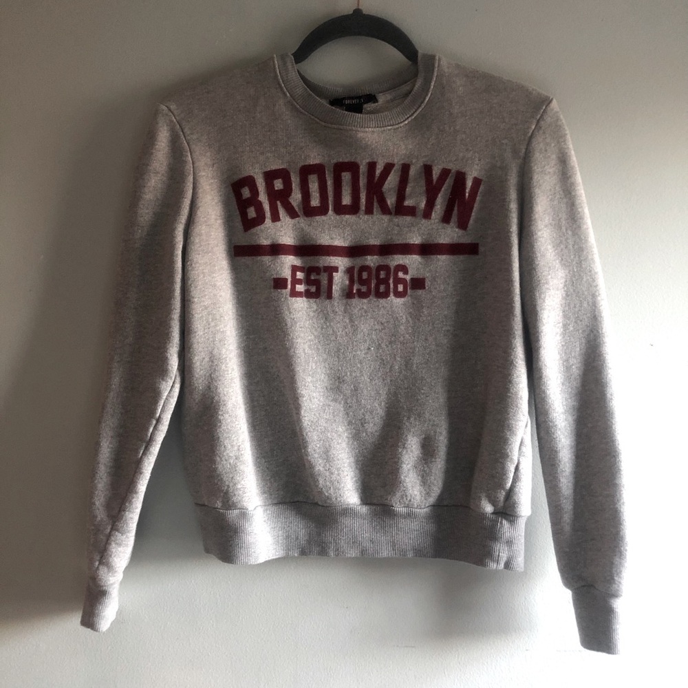 Grey and red sweatshirt